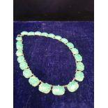 Jade / white metal necklace.