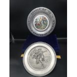 2 collectable pewter plate s depicting pirate sailor.
