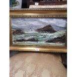 Raised out oil Painting depicting coastel scene signed in gilt framing.