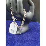 Heavy Silver Charm Bracelet With Heart Lock.