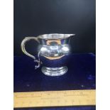 Large unusual silver Hall marked London cream jug maker James Ramsay 204 grams.