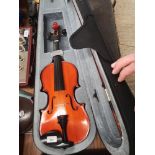 Violin in fitted case.