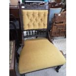 Antique button back gentleman's chair.