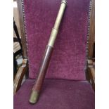 Leather bound brass two-draw telescope "Rifleman T H Steward Ltd London", 30cm when closed, 64cm