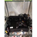 Xbox 360 slim line Console with controller s working order.