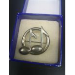 Silver 925 music symbol brooch.