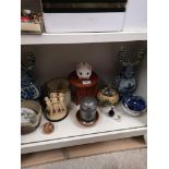 Shelf of collectables includes delft candle sticks af.