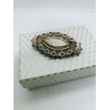 Antique silver brooch.