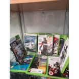 Shelf of xbox 360 games.