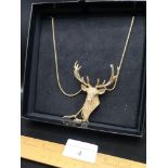 Butler Wilson stag necklace with display box..