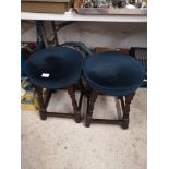 Pair of vintage bar stools with blue upholstery.