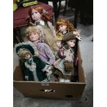 Box of porcelain dolls.