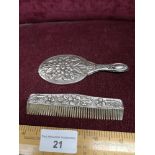 Silver baby's comb and mirror set marked 900..