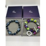 2 brand new boxed designer Pia bracelets.