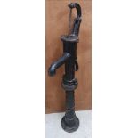 Large antique cast iron water pump.