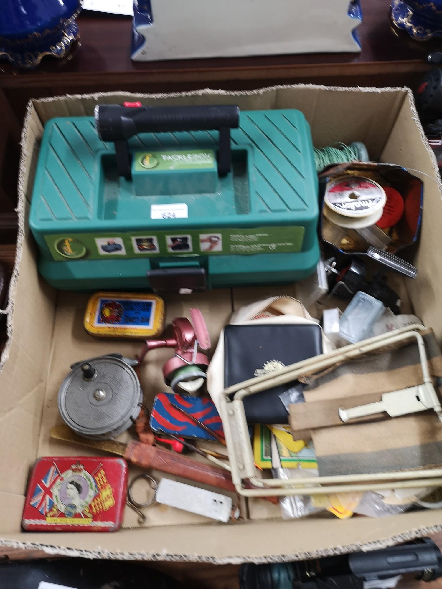 Large box of fishing items to include fishing tackle box reel etc.