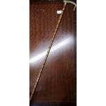 1900s unusual carved walking stick with horn design.