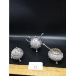 3 Asian Silver cruets in decorative design.