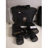 Set of boots pacer 8 x30 binocalurs with case.