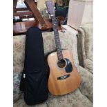 Large riks acoustic guitar.