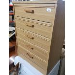 Teak style chest of 5 drawers .