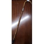 Large carved walking stick With white metal collard..