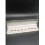 Silver bracelet set in Amber stones.
