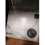 Boxed playstation one console.