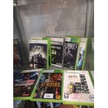 Shelf of xbox 360 games.