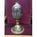 Early Arabic brass, enamel and white metal vase. Stands 12 inches tall.