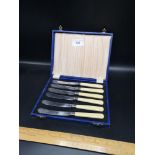 Set of 6 silver Hall marked collard knifes with ivorine handles in fitted case.