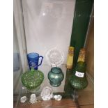 Shelf of art glass Wares.