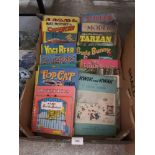Box of vintage annuals to include yogi bear, top cat etc.