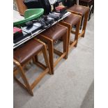 Set of 4 leather topped retro stools.