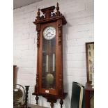 Large victorian wall. Clock with weights and pendulum.