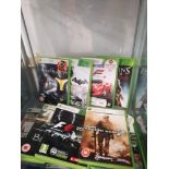 Shelf of xbox 360 games.