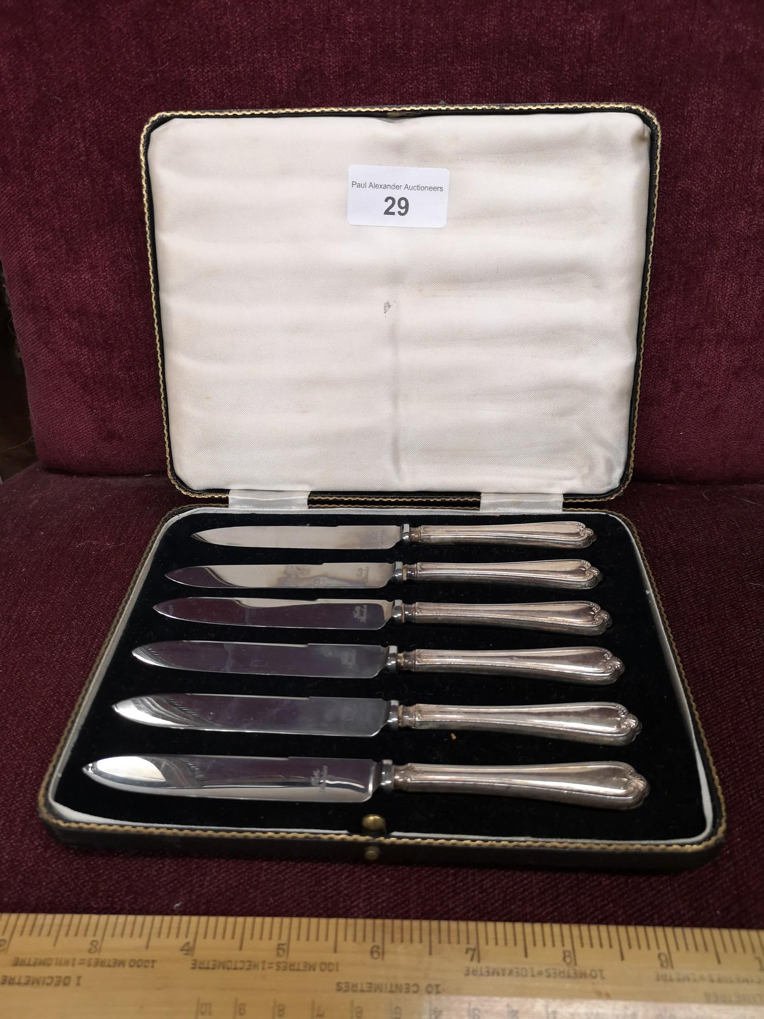 Set of 6 silver Hall marked handled knifes In Fitted casing.