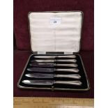 Set of 6 silver Hall marked handled knifes In Fitted casing.
