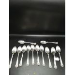 Silver Hall marked london set of 12 Kings pattern desert spoons maker AHN. 736 grams..