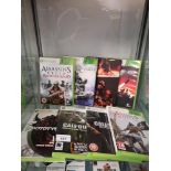 Shelf of xbox 360 games.