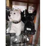 Pair of scottish westie black and white decanters.