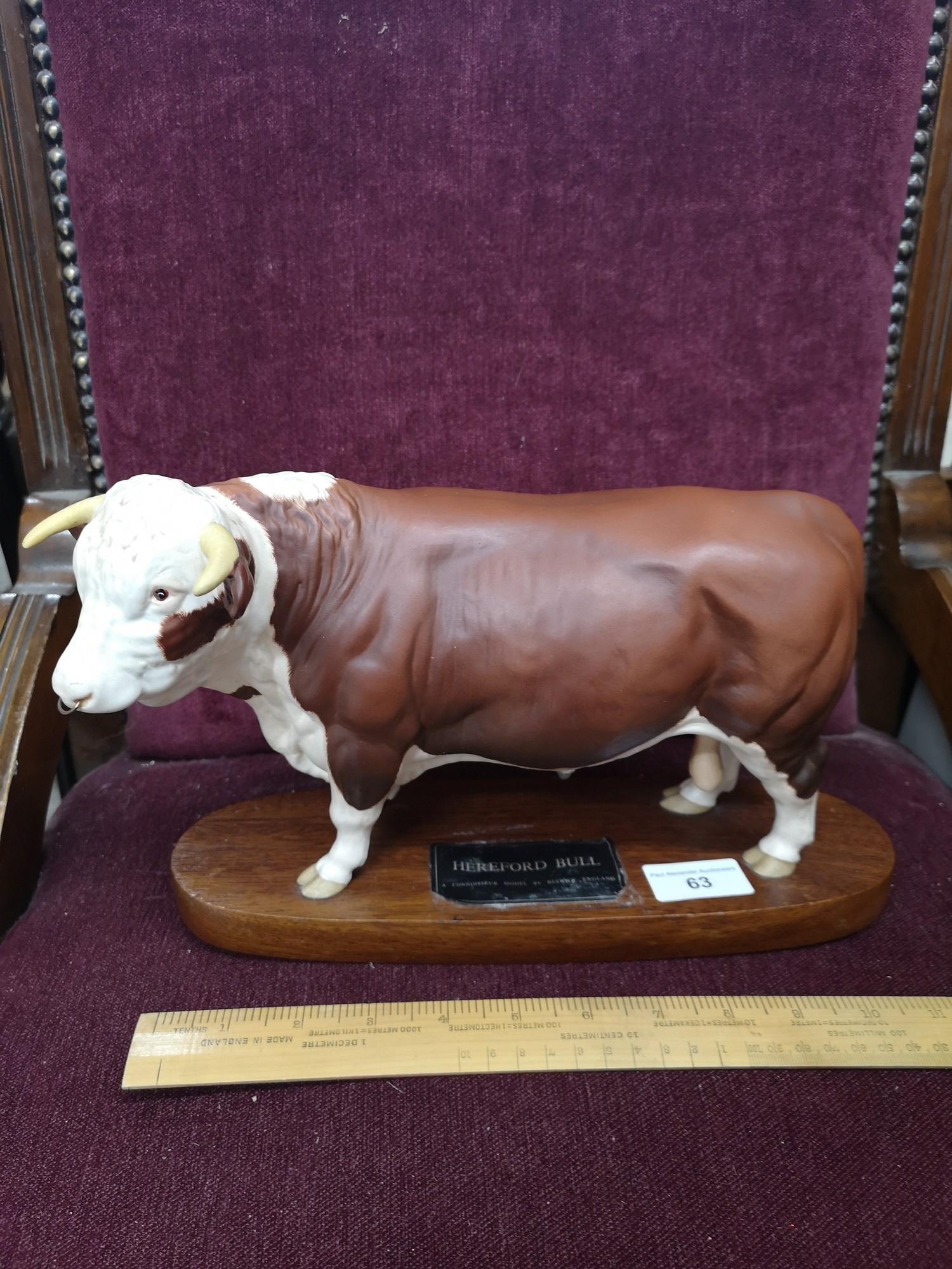 Large Beswick connoisseur Hereford bull on plinth.