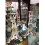 Pair of French porcelain candle sticks as found.