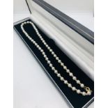 Pearl necklace with 375 gold clasp boxed.