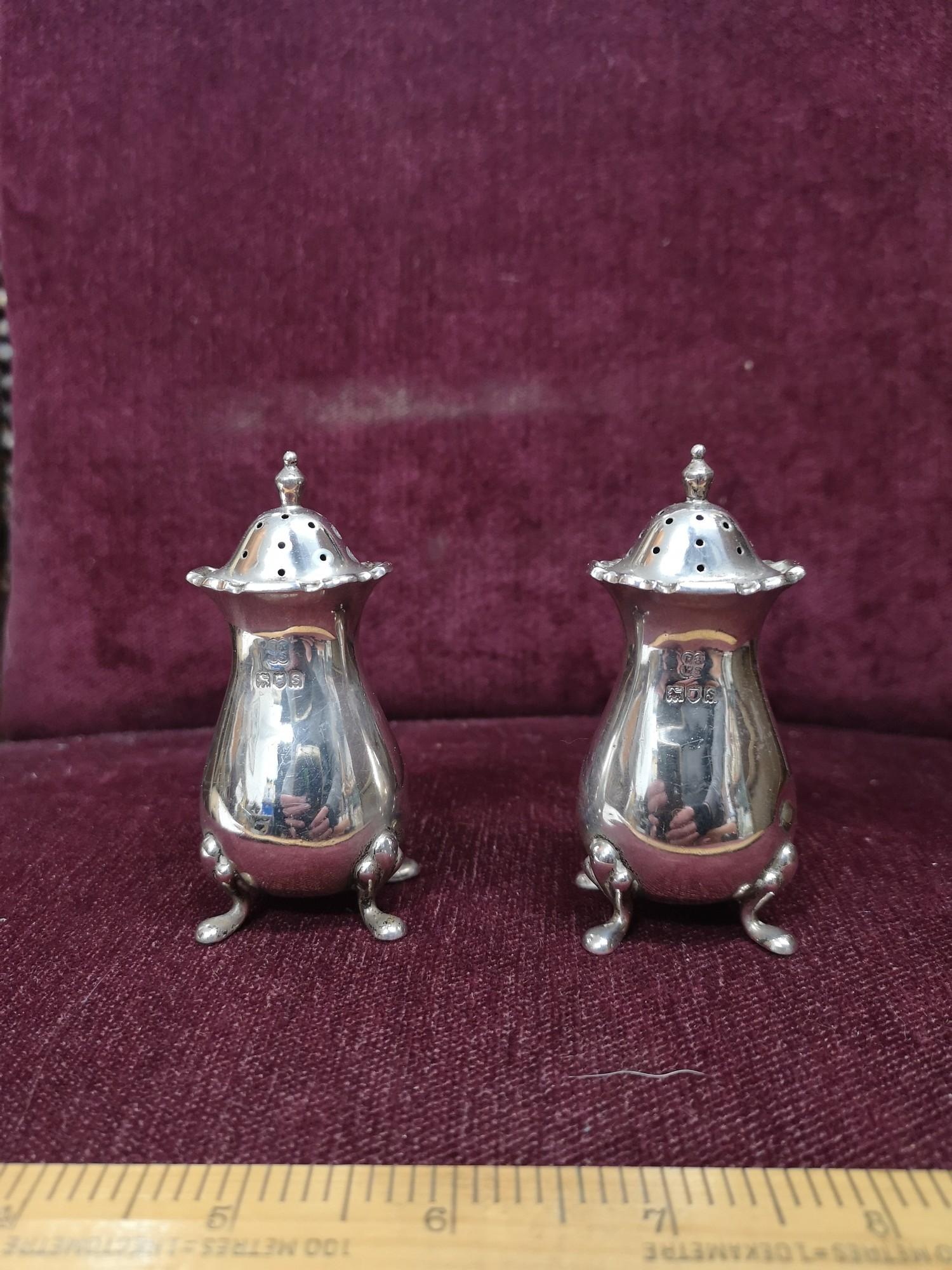 Pair of silver Hall marked pepperette s.