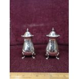 Pair of silver Hall marked pepperette s.