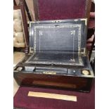 Large antique writing slope with fitted interior with double section inkwells with fitted brass