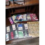 Collection of rugby programmes cigarette cards etc..