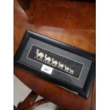 Vintage camels framed in white metal.