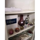 Shelf of caithness glass etc.